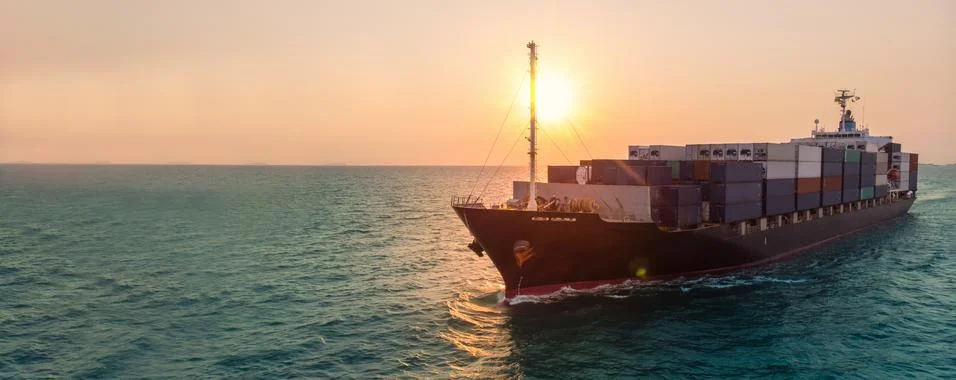 Smart cargo container  ship at sunset import export container concept freight Stock Photos