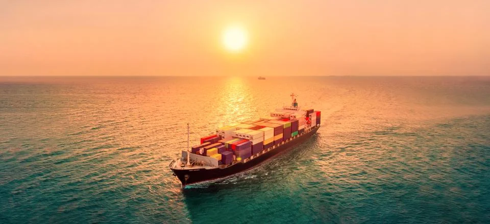 Smart cargo container  ship at sunset import export container concept freight Stock Photos