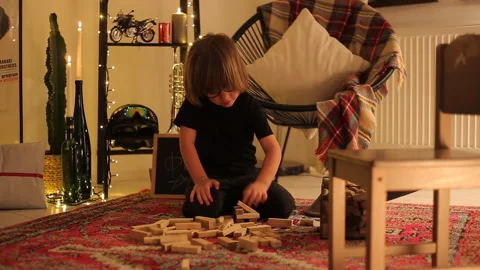 Smart Child Boy Plays Lying On Floor At Home Stock Footage 145335948