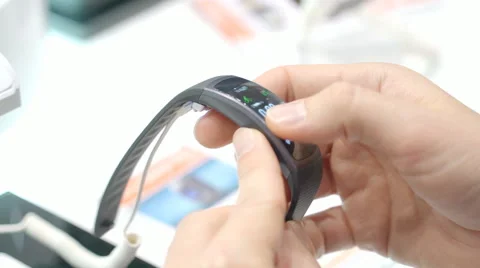 Smart Clock in the Hands Gadget Study Stock Footage 68386472