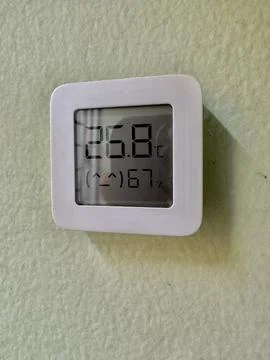 A smart clock on the wall Stock Photos