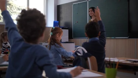 Smart elementary age pupils active during lesson 스톡 동영상 122538448