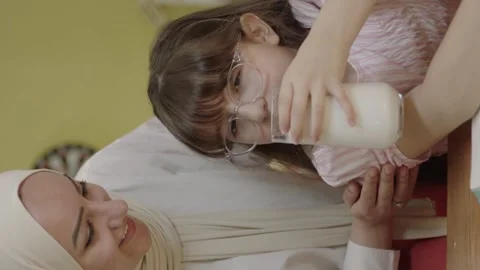 Smart elementary school girl learning to write, doing math homework. Stock Footage 204717286
