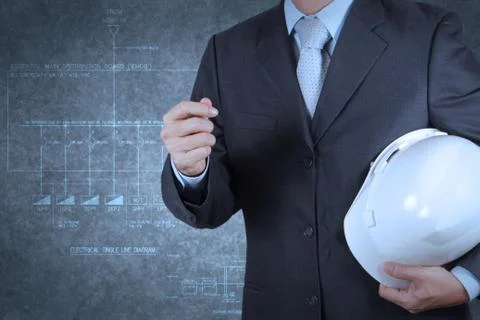 Smart engineer with an electronic single line and fire alarm riser schematic Stock Illustration