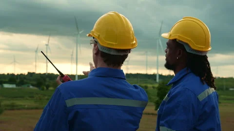 Smart engineer with protective helmet holding the blueprint working at elec.. Stock Footage 269101643