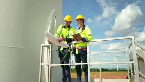 Smart engineer with protective helmet holding the blueprint working at elec.. Stock Footage 269102598