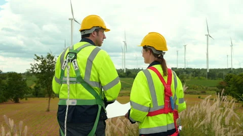 Smart engineer with protective helmet holding the blueprint working at elec.. Stock Footage 269103037