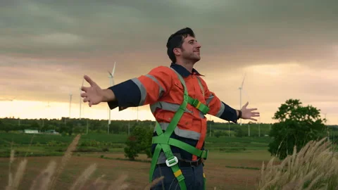 Smart engineer with protective helmet rising hands up  at electrical turbin.. Stock Footage 269100799