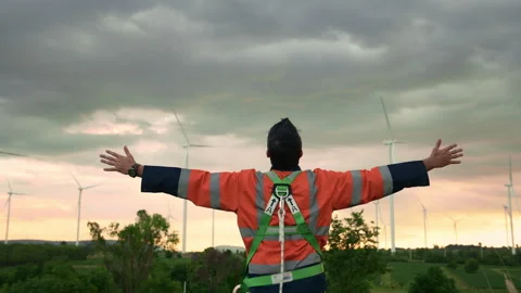 Smart engineer with protective helmet rising hands up  at electrical turbin.. Stock Footage 269100880