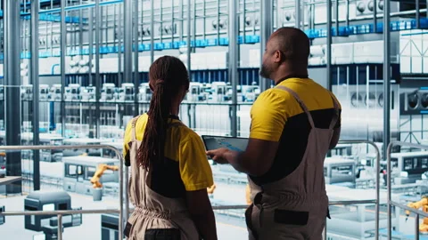 Smart factory engineering team designs robotic machines using CAD software Stock Footage 305492648