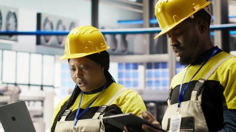 Smart factory engineering team implement automated workflows Stock Footage 307365176