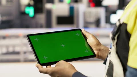 Smart factory expert uses green screen tablet to implement automated workflows Stock Footage 307361680