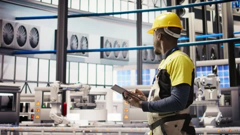 Smart factory expert uses tablet to implement automated workflows Stock Footage 308710839