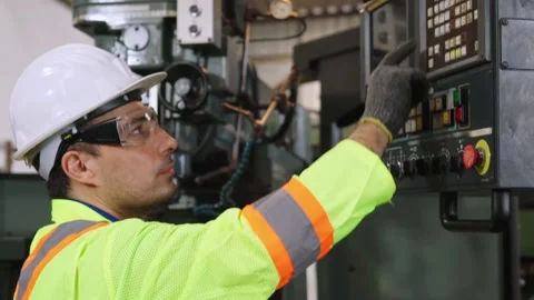 Smart factory worker using machine in factory workshop Stock Footage 141812839