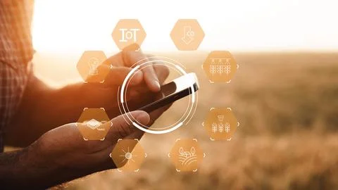 Smart farm technology in use during sunset in agricultural field Stock Photos
