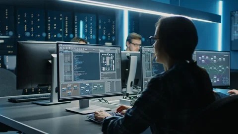 Smart Female IT Programer Working on Desktop Computer in Data Center System Stock Footage 103267973