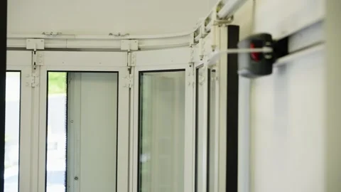 Smart garage door closing in real time motor powered system and roller guides Stock Footage 313534818