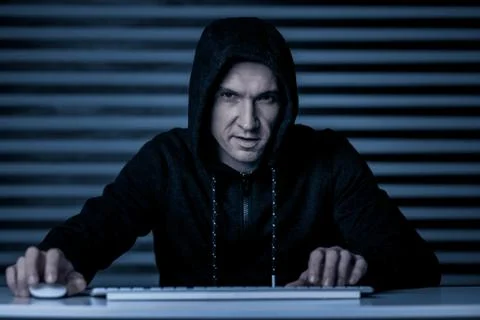 Smart genius man trying to hack a website 写真素材