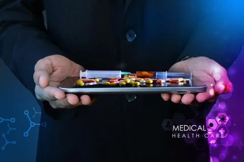 Smart hand showing the tablet computer and pills Stock-Illustration