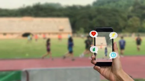 Smart health exercise checking concept. A man hand using smartphone checking  Stock Photos