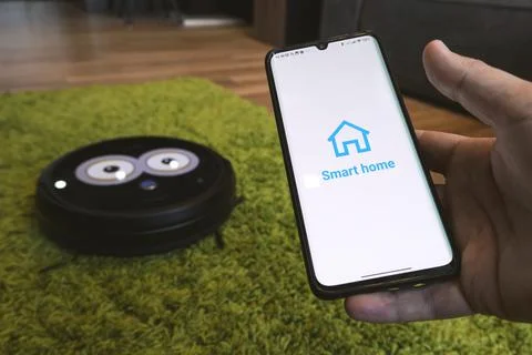 Smart home app on smartphone. remote control of electronic devices in apartme Stock Photos