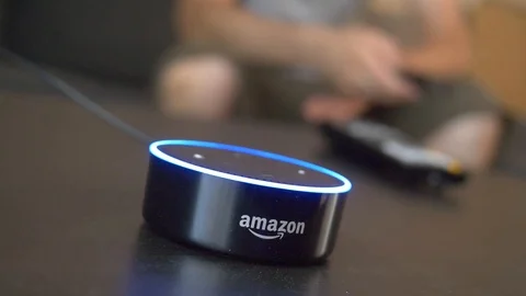 Smart Home Assistant Voice Activated While Watching TV in The Background 스톡 동영상 93563561