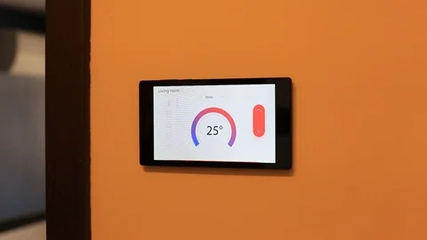 Smart home climate control device on a wall Stock Footage 106133006