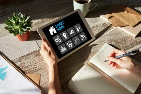 Smart home concept, control panel software on device screen. Stock Photos