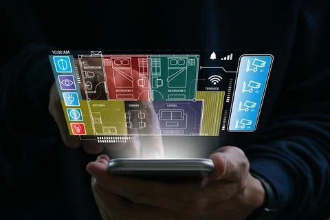 Smart home concept.Hand of man using smart home control app on mobile phone.. Stock Photos