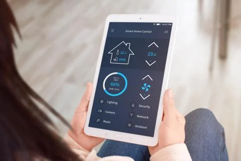 Smart home control app on tablet display. Close-up. Stock Photos