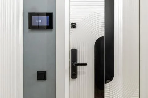 Smart Home Entrance with Digital Intercom and White Door Stock Photos
