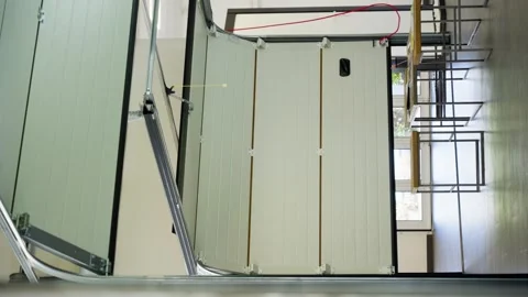 Smart home garage door automatically opens Stock Footage 313536495