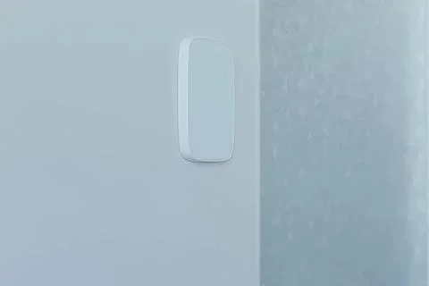 Smart home light switch on wall in a modern room Stock Photos