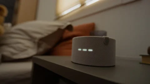 Smart Home Speaker Displaying Time with Voice Assistant Activation Stock Footage 340799857