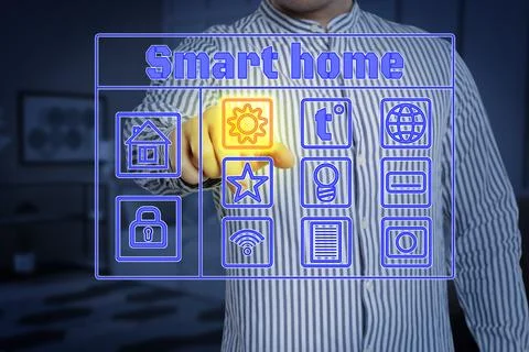 Smart home system. Man using digital interface in room, closeup Stock Photos