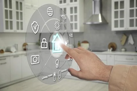 Smart home system. Man using digital interface in room, closeup Stock Photos