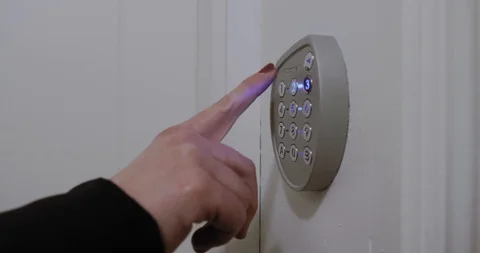 Smart homes, security and protection concept. A woman unlocking the door Stock Footage 123453338