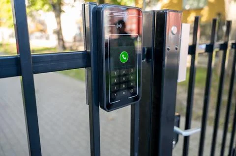 Smart intercom with face recognition on residential gate Stock Photos