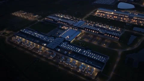 Smart internet services hub with AI-driven data center at dusk. Stock Footage 318620494