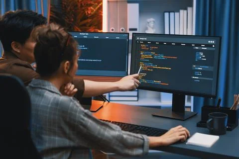 Smart IT developer looking at coding program application at back side. Infobahn. 스톡 사진