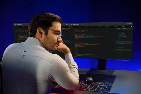 Smart IT working software development screen pose on camera looking. Surmise. Fotos de archivo