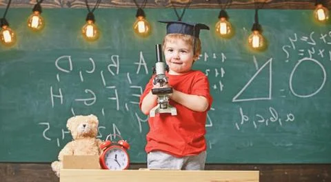 Smart kid concept. First former interested in studying, learning, education. Kid Stock Photos