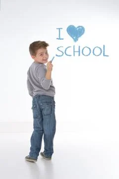 Smart kid looking back Stock Photos