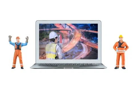 Smart laptop computer is showing construction industry concept on screen an.. 스톡 사진