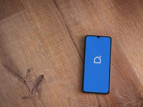 Smart Life app launch screen on smartphone on wooden background Stock Photos
