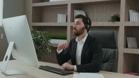 Smart-looking and representive middle-aged business consultant leads a session Stock Footage 196297544