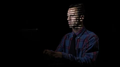 Smart male computer programmer attacking cyber security servers from his unde Stock Footage 86451814