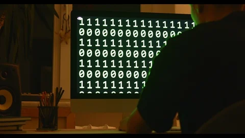 Smart man programmer working at home in loft room writing programming code for Stock Footage 115491843