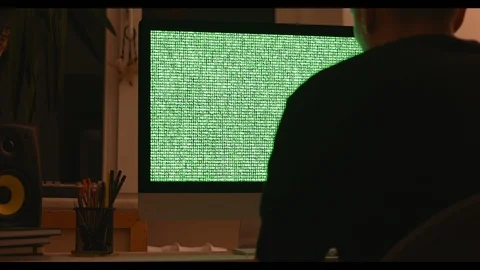Smart man programmer working at home in loft room writing programming code for Stock Footage 115491890