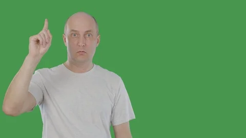 Smart man thinking and raising index finger up when he found solution problem Stock Footage 90176083